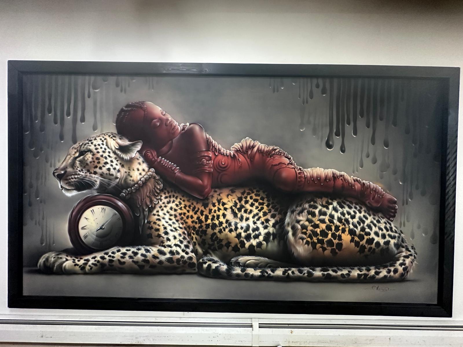 Finished KengArt child, leopard and clock artwork in its black frame